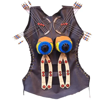 G-avants 4, a leather bodice with blue discs and beaded spikes at the shoulders, by George Kamiti