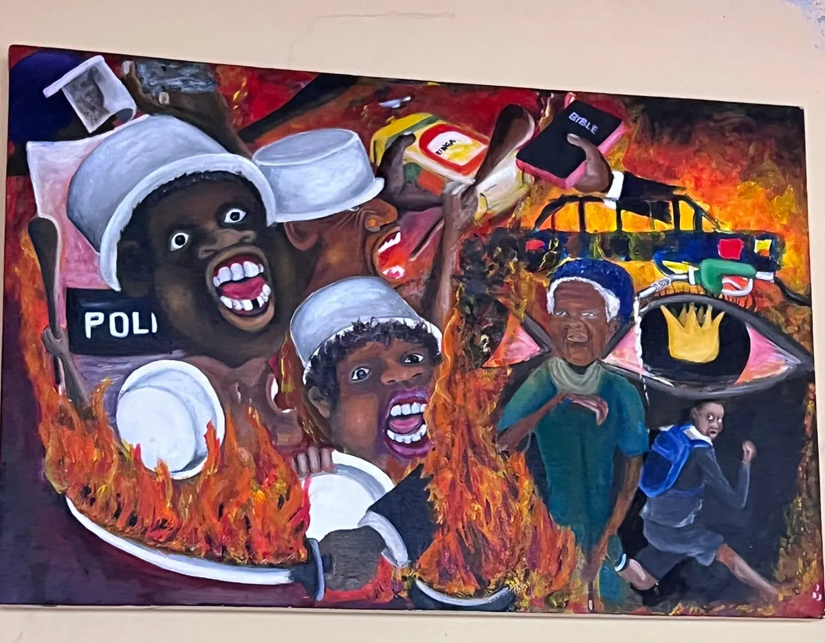 A crowded painting of a street confrontation. Helmeted figures with riot shields and batons fill the left, mouths open mid shout, flames run across the centre, a hand holds up a Bible, and a child in school uniform runs at the right